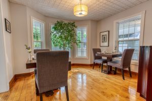 Two tables for two in guest dining room at Craigleith Manor Boutique bed and breakfast
